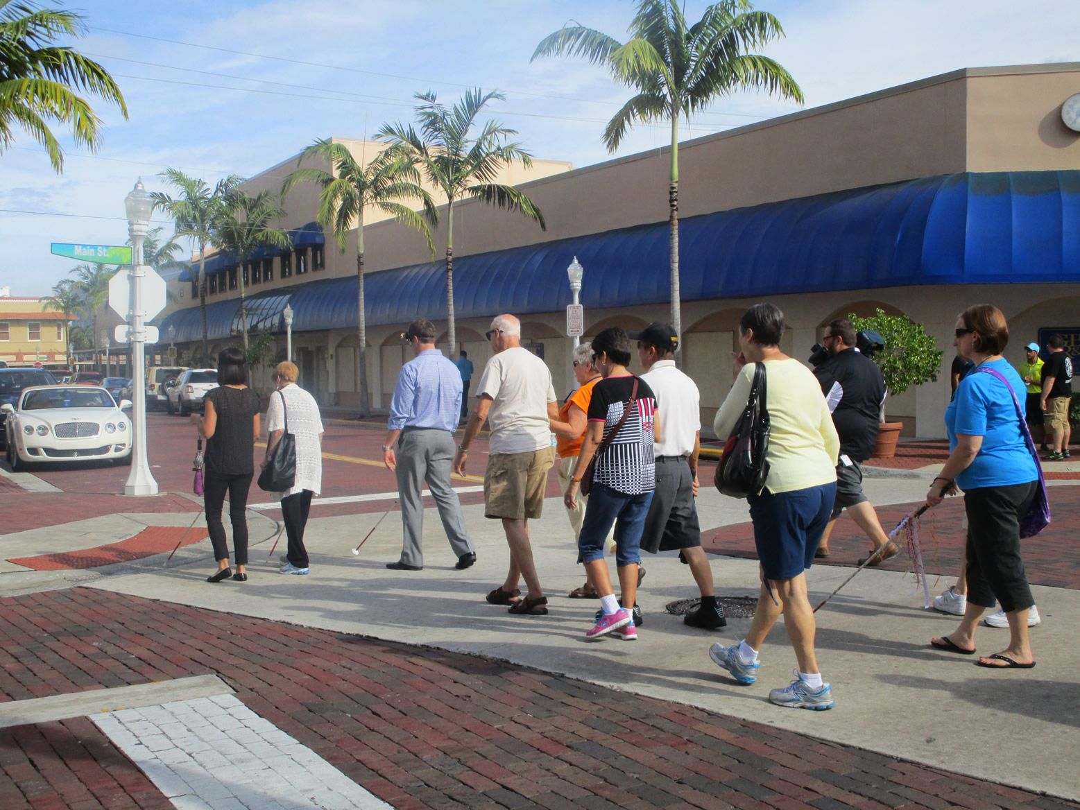 50th anniversary of white cane safety day swfcb crossing the street as a group 2014
